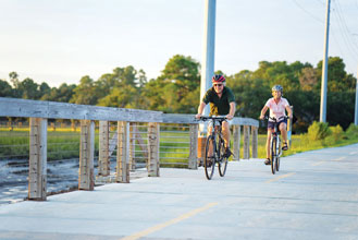 Spanish Moss Trail Couple Biking